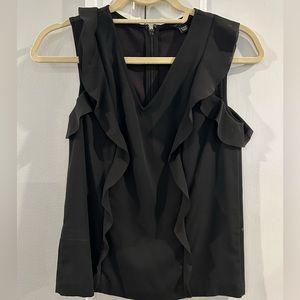 Black Ann Taylor sleeveless blouse with ruffle. Size XXS.